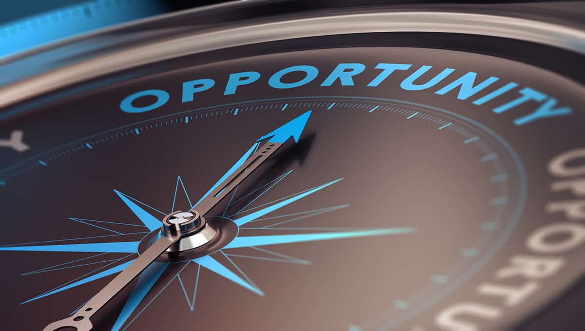 Business Opportunity Compass with needle pointing the word opportunity, concept image to illustrate business opportunities and strategy.